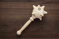 Wooden toy mace on the table