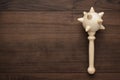 Wooden toy mace on the table