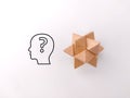 Wooden toy puzzle with question icons Royalty Free Stock Photo