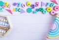 Wooden toy rainbow, numbers, blocks, pastel color arc on pink background. Natural no plastic toys for creativity development. Royalty Free Stock Photo