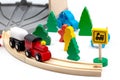 Wooden toy set with train, tracks and trees with depot, people and wooden signs for children\'s play