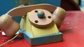 Wooden toy telephone Royalty Free Stock Photo