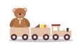 Wooden toy train with colorful blocs and teddy bear