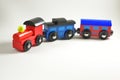 Wooden toy train with colorful blocs on white background Royalty Free Stock Photo