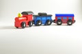 Wooden toy train with colorful blocs on white background Royalty Free Stock Photo