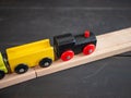 Wooden toy train with dark background Royalty Free Stock Photo