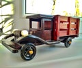 A wooden toy vintage brown dump truck Royalty Free Stock Photo
