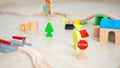 Wooden toys on the floor of a room Royalty Free Stock Photo