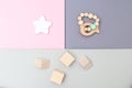 Wooden toys on pastels color background. Flat lay