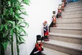Wooden toys with traditional red British army soldier uniform costume on a stairs Royalty Free Stock Photo