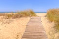 Wooden track leading to the beach Isla Canala, Ayamonte, Spain