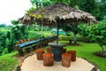 Wooden traditional Polynesian shelter with palm thatch roof, Sopoaga Waterfall resort in Samoa, Upolu Island Royalty Free Stock Photo