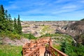 Wooden trail through the badlands of Horseshoe Canyon, Drumheller, Canada Royalty Free Stock Photo