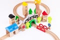 Wooden train and railway road educational toys for kids on white background Royalty Free Stock Photo