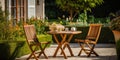 Wooden transforming chairs and a table, brown, stand on the open veranda, in the courtyard of the house , concept of Royalty Free Stock Photo