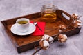 A wooden tray with cutlery for drinking tea Royalty Free Stock Photo