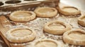 Wooden tray holding assorted uncooked cookie dough ready for baking