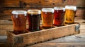 Five Glasses of Assorted Beer on Wooden Tray Royalty Free Stock Photo