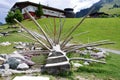 Wooden tree trunk artwork by the footpath at The Witches Water, HochsÃ¶ll, Tyrol, Austria.