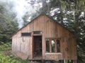 Wooden triangular house in the mountains