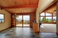 Wooden trim home with open floor plan. Wooden cabinet with granite counter top Royalty Free Stock Photo