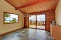 Wooden trim home with open floor plan. Wooden cabinet with granite counter top Royalty Free Stock Photo