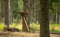 Wooden tripod and a table for cards of wartime. Cartographer equipment