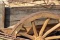 Wooden trolley wheel traditional and beige and weathered closeup