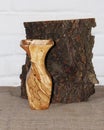 Wooden vase in a rustic style