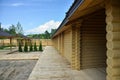 Wooden veranda overlooking the courtyard with trees Royalty Free Stock Photo