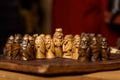 Wooden Viking chess hnefatafl on a wooden carved board made of dark wood