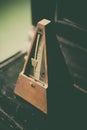 Wooden vintage metronome Royalty Free Stock Photo