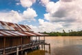 Wooden vintage style stilt house built above river Bangprakong, Royalty Free Stock Photo