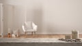 Wooden vintage table top or shelf with candles and pebbles, zen mood, over blurred empty room with armchair, and decor, white arch Royalty Free Stock Photo