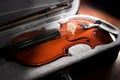 Wooden violin in black case. Royalty Free Stock Photo