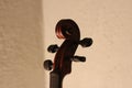 Wooden violin head in brown color Royalty Free Stock Photo