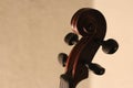Wooden violin head in brown color Royalty Free Stock Photo