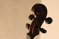 Wooden violin head in brown color Royalty Free Stock Photo