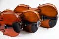 The wooden violin,three violins stacked on white background Royalty Free Stock Photo