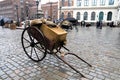 Riga, Latvia, November 2019. Medieval transport trolley on the town hall square.