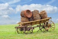 Wooden wain with baskets Royalty Free Stock Photo