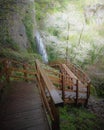 Wooden walk going down to the base of the water fallen from heaven.