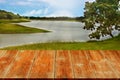 A wooden walk way or table on a blurry meadow Royalty Free Stock Photo