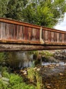 Wooden Walking Bridge Over Small Creek