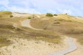 Wooden walking path in Dead Dunes in Neringa, Lithuania.