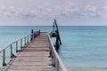 Wooden walking way leading to the seacoast Royalty Free Stock Photo