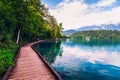 Wooden walkway around the lake Bled Royalty Free Stock Photo