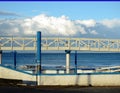 wooden walkway facing the blue sea Royalty Free Stock Photo