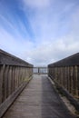 Wooden Walkway Heading to Ocean Royalty Free Stock Photo