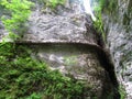 Wooden walkway leading into a cave at Pokljuka gorge in Gorenjska, Slovenia